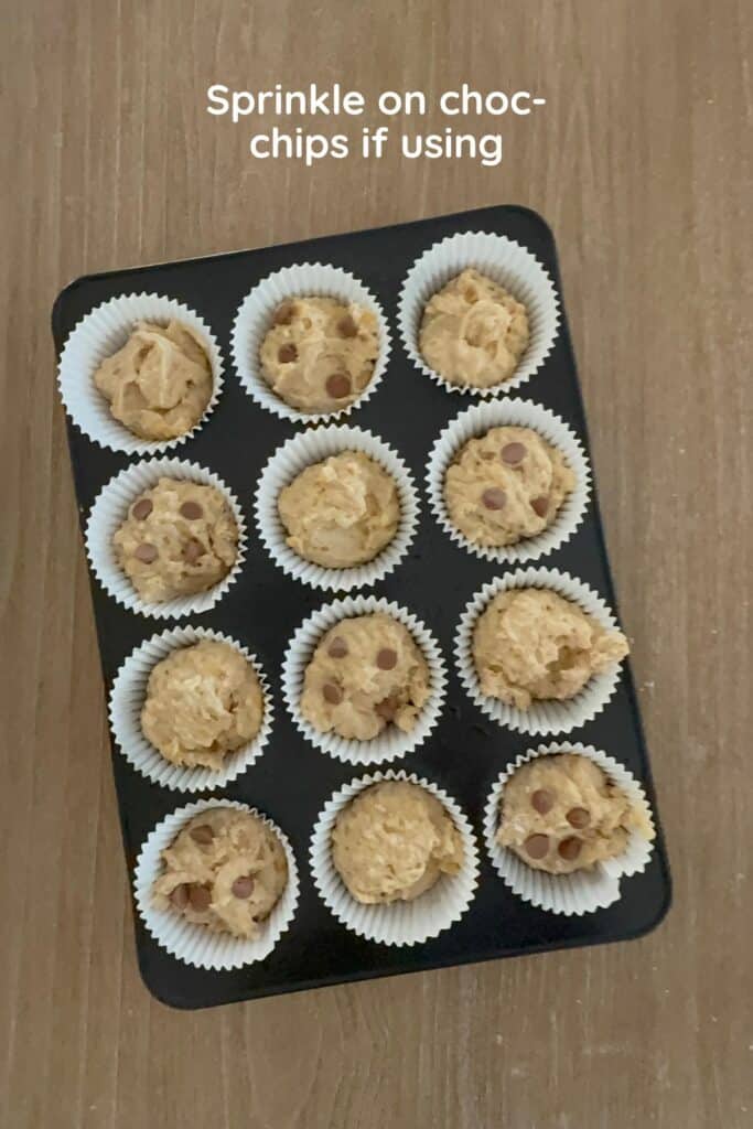 Divide batter evenly among muffin cups and top with chocolate chips if using.