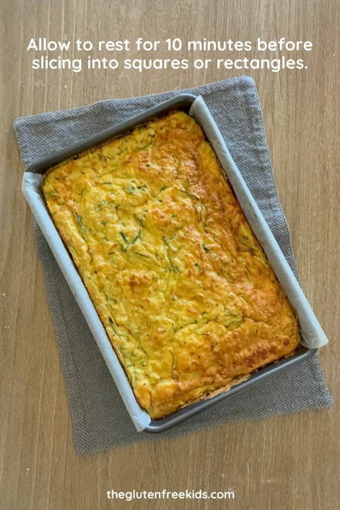 Freshly baked gluten-free zucchini slice cooling in the dish.