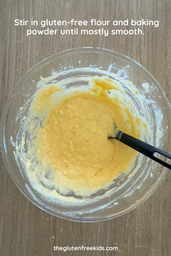 Gluten-free flour and baking powder added to egg mixture.