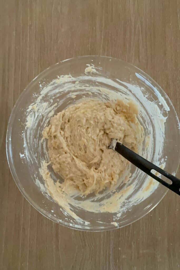 add dry ingredients for gluten-free banana muffins and mix to just combine
