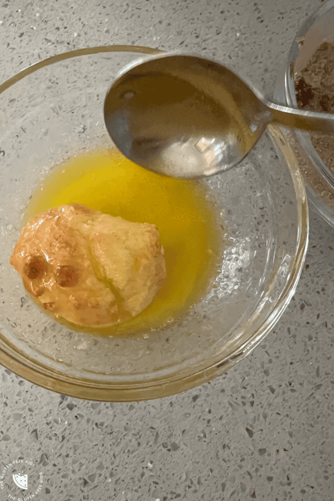 dunk gluten free donut holes in butter