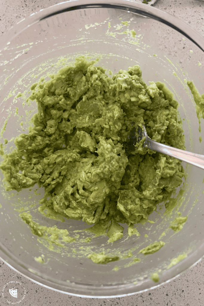 mash avocado with a fork for guacamole