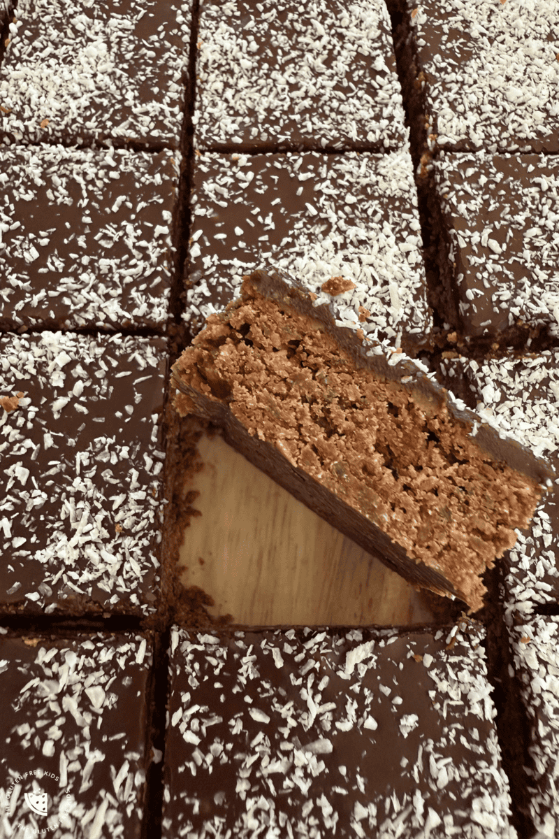 Kids baking chocolate cornflake bars with gluten-free ingredients