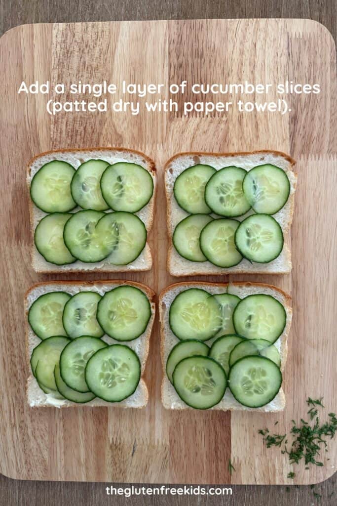 Add a single layer of cucumber slices (patted dry with paper towel).