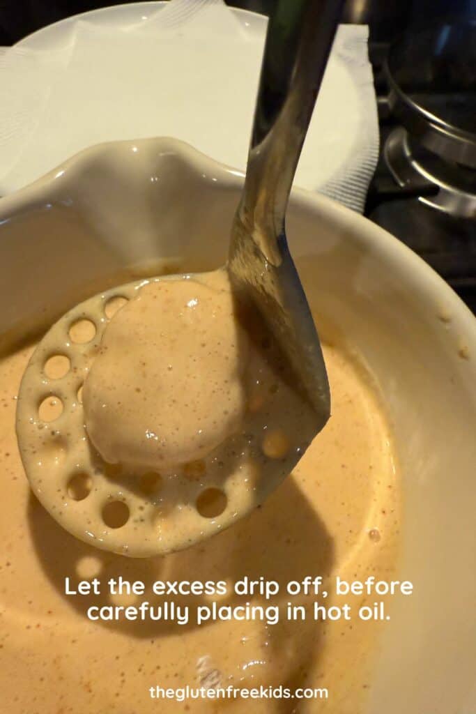 let the excess batter drip off