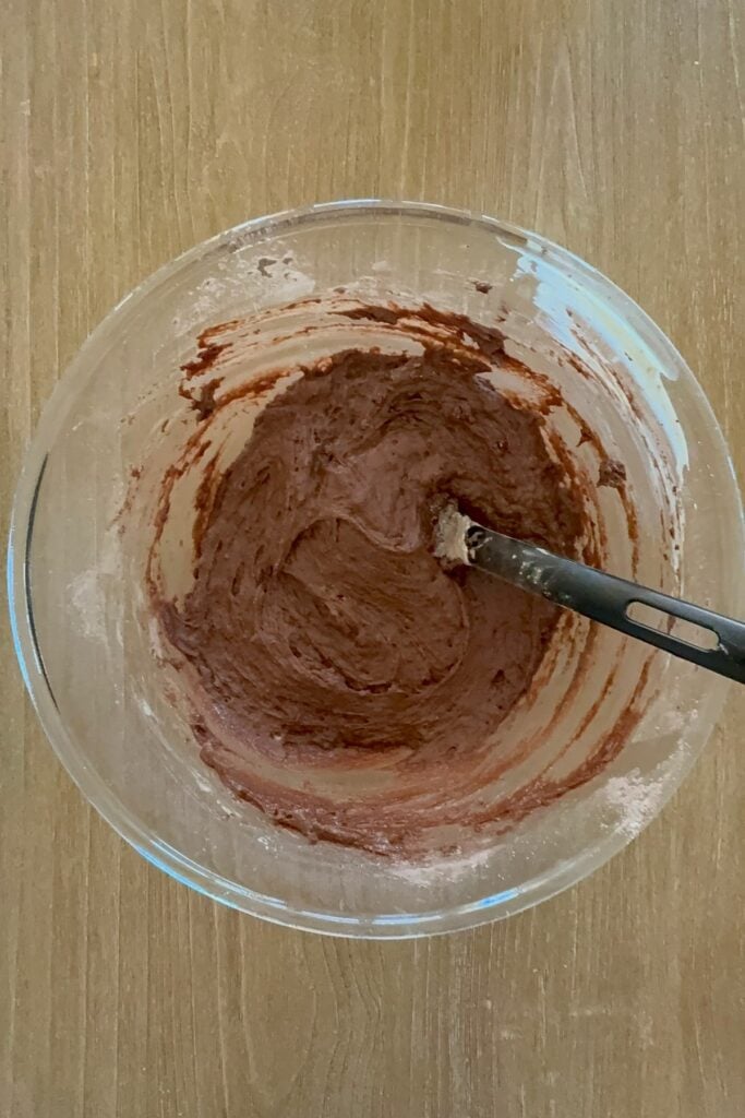 add the dry ingredients to make gluten-free chocolate muffins