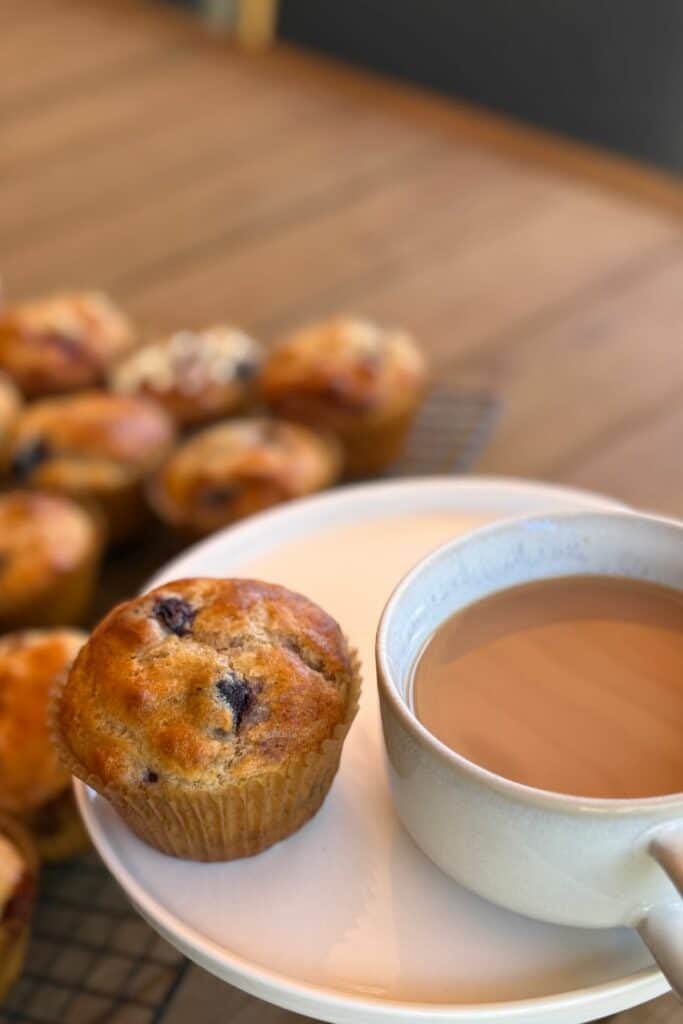 cup of tea with gluten-free blueberry muffin