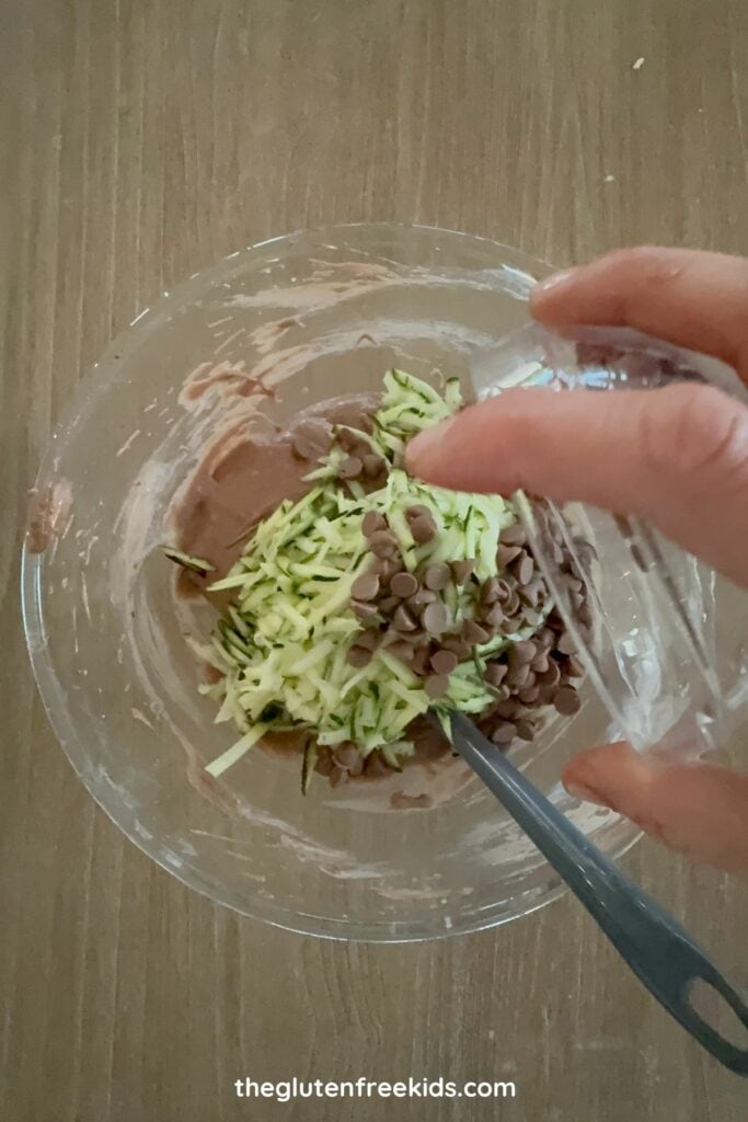 gently fold in the grated zucchini and choc chips