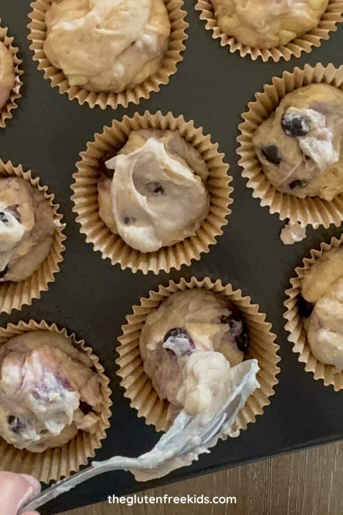 place the gluten free blueberry batter into the liners