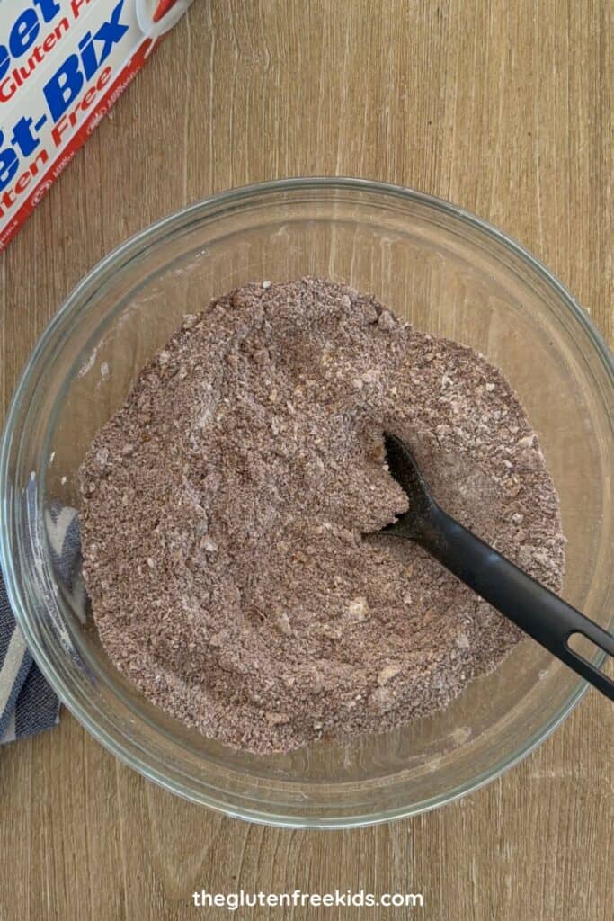 Add the gluten-free self-raising flour, desiccated coconut, cocoa powder and brown sugar