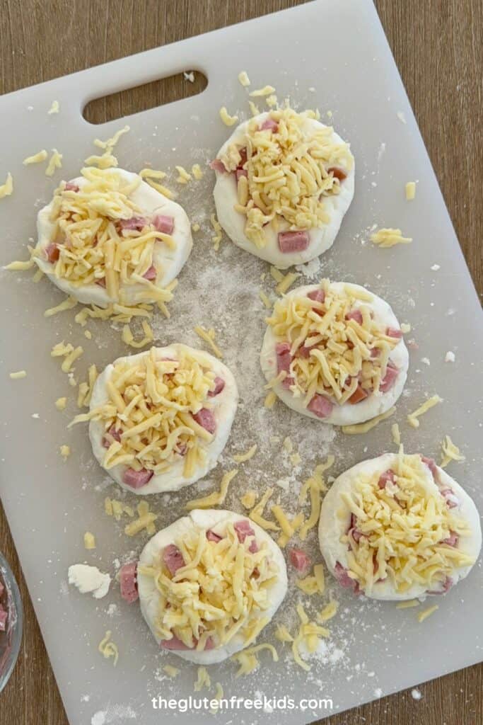 Ham & Cheese Rolls topped with cheese