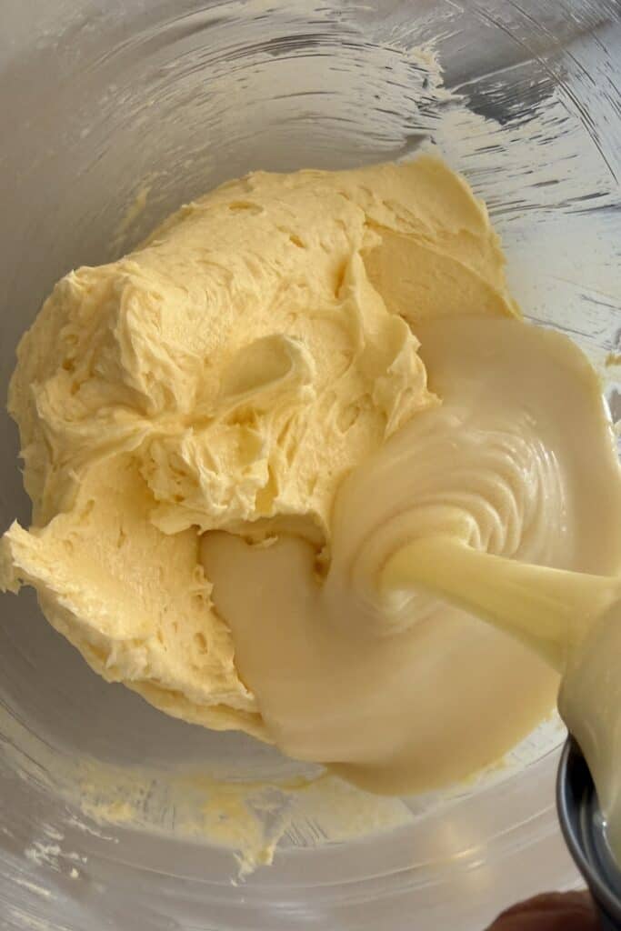 Pour in sweetened condensed milk and mix until fully combined.