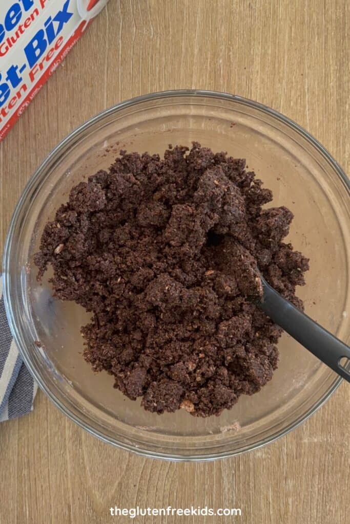 Stir until a thick, damp mixture forms.